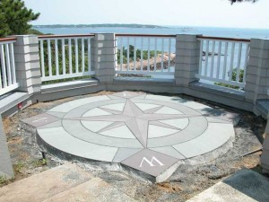 8 foot Diameter Compass Rose waterjet cut from 2 thick bluestone using three different colored stones. N,S,E and W are from 1/4 thick stainless steel.