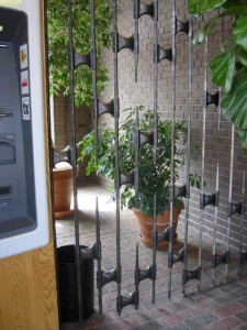 Decorative security screen with concealed gate at the Newburyport Institution for Savings, Story Avenue branch, Newburyport, MA.