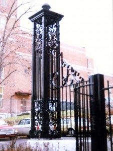 Custom wrought ironwork column with scroll details.