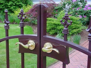 Wrought Iron Pedestrian Gate at Private Residence with waterjet lock box.